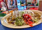 Smothered entrée with guacamole and pico de gallo